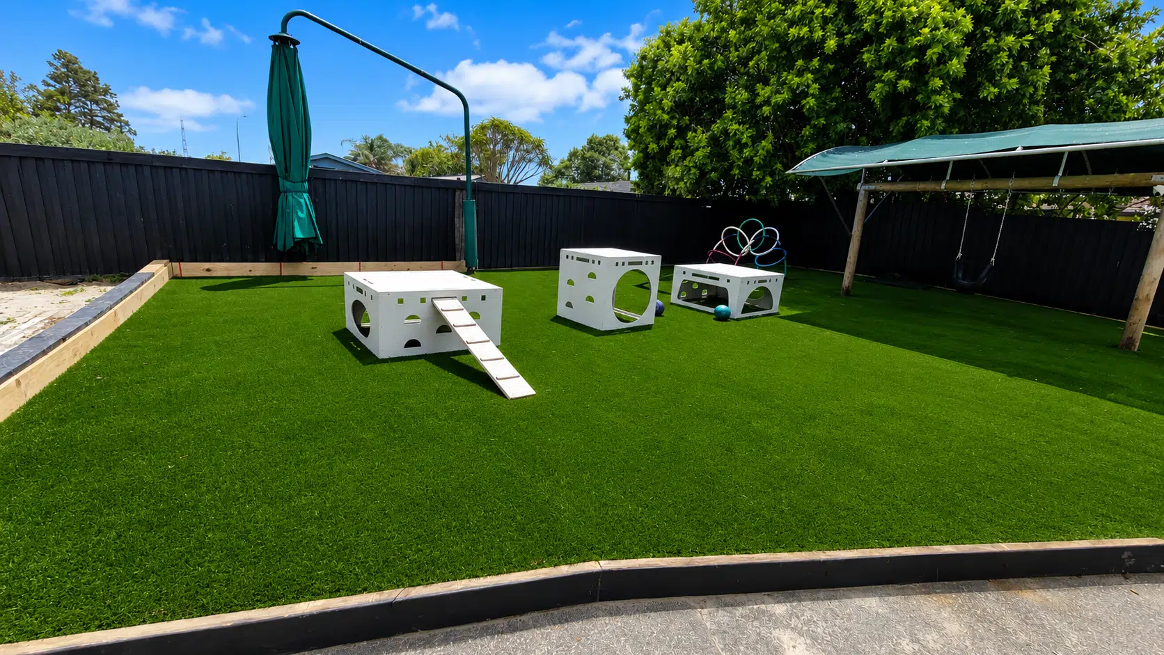 Artificial Grass vs Bark for Childcare Centres: Which Playground Surface Is Best?